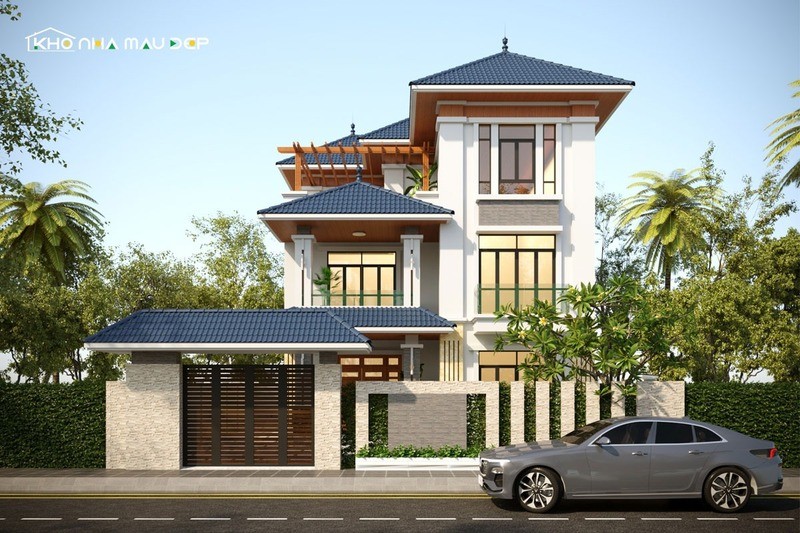 Mẫu nhà 3 tầng mái Nhật ở nông thôn với mặt tiền được bao phủ bởi các ô cửa kính lớn