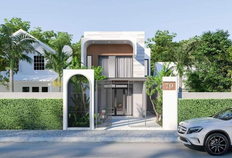 Mẫu nhà gác lửng mái bằng hiện đại có sân rào đơn giản